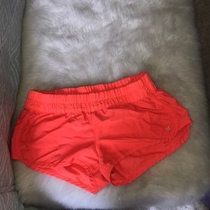 neon orange shorts